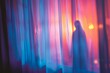 An unsettling silhouette of a figure standing behind curtains illuminated by red light.