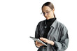 © muse studio - The secretary is a young woman with glasses using an office tablet. Transparent isolated background.