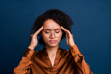 Poster - Photo of tired stressed woman dressed brown silk shirt eyewear hands temples overworking isolated blue color background