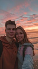 Wall Mural - Boy and girl couple taking selfie on a beach standing