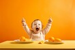 Charming happy little baby eating first food gat home