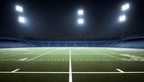 Fototapeta Sport - Empty football field at night with illuminated stadium lights and a dark cloudy sky