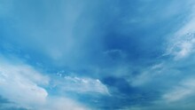 Blue Sky White Clouds Moving In Opposite Direction. B-Roll Clouds While Sunrise Sky. Paradise Concept. Background Worship Christian Concept.