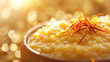 Close-up of a creamy saffron risotto garnished with delicate saffron threads, symbolizing gourmet Italian cuisine.