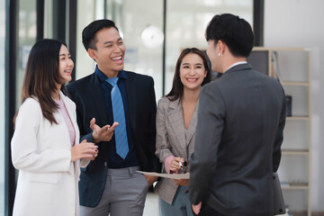 Poster - Young smart business colleagues collaborating and gathering news idea together in the meeting room.