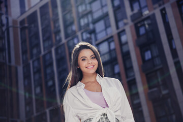 Poster - Photo of positive lovely girl toothy smile good mood free time sightseeing city center street outside