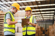 © chokniti - Man and woman workers with clipboard discussing working and checking stock inventory wood plank material for making wooden pallet products at warehouse industrial factory, woodwork production