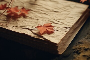Poster - A book with a leaf on top of it. Ideal for educational and nature-themed projects