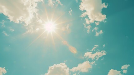 Poster - Sun shining brightly through clouds in a blue sky, ideal for nature and weather concepts