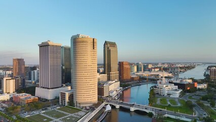 Canvas Print - Contemporary high skyscraper buildings and street traffic in downtown district of Tampa city in Florida, USA. American megapolis with business financial district.