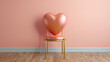 Heart-shaped chair against a peach wall