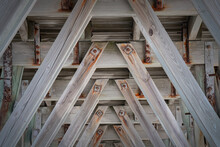 Wooden  Beams Under A Fishing Pier
