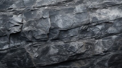 Poster - A striking black and white image of a rugged rock face. Perfect for geology or nature-themed projects