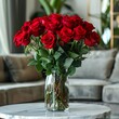 Bouquet of red roses in a vase on a table 