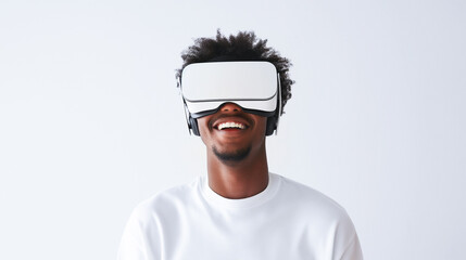 Portrait of a laughing young black guy in white augmented virtual reality glasses on a isolated white studio background with copy space. Man in VR glasses