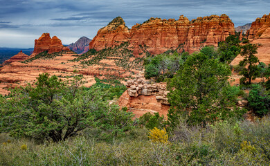 Wall Mural - Red rock formations of Damfino Canyon in Sedona Arizona on a cloudy day