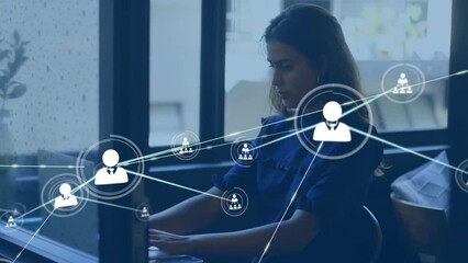Poster - Animation of network of connections with icons over caucasian woman using laptop