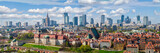 Fototapeta Miasto - Warsaw old town and distant city center, PKiN and skyline under blue cloudy sky aerial landscape