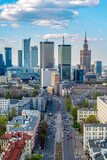 Fototapeta Miasto - Warsaw city center, PKiN and skyscrapers under blue cloudy sky aerial landscape