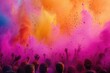 A vibrant haze of pink and orange dust over an exuberant outdoor gathering.