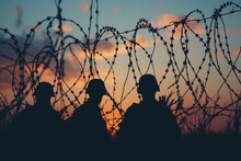 Soldiers Patrol The Border Fence