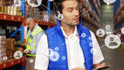 Poster - Animation of network of connections with icons over caucasian male worker in warehouse