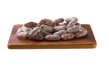 Wall Mural - mini salami sausages on cutting board isolated 