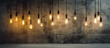A Group Of Light Bulbs Hang From The Concrete Ceiling, Illuminating The Space With Their Bright Light. The Bulbs Are Suspended At Varying Lengths, Creating An Interesting Visual Display.