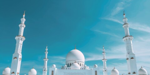 white mosque with high tower, bright blue sky background as free space, islamic banner poster card design