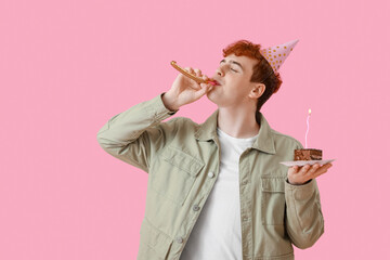 Poster - Young man with party blower and piece of birthday cake on pink background