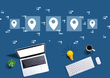 Fototapeta Miasto - Map pin concept with computers with a light bulb from above