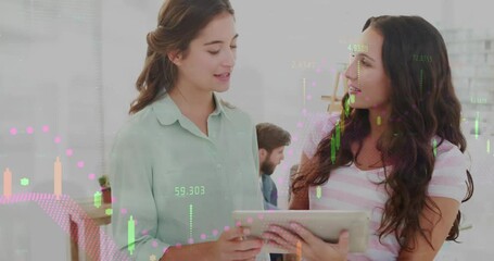 Wall Mural - Animation of financial data processing diverse businesswomen using tablet