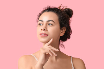 Sticker - Beautiful young African-American woman on pink background