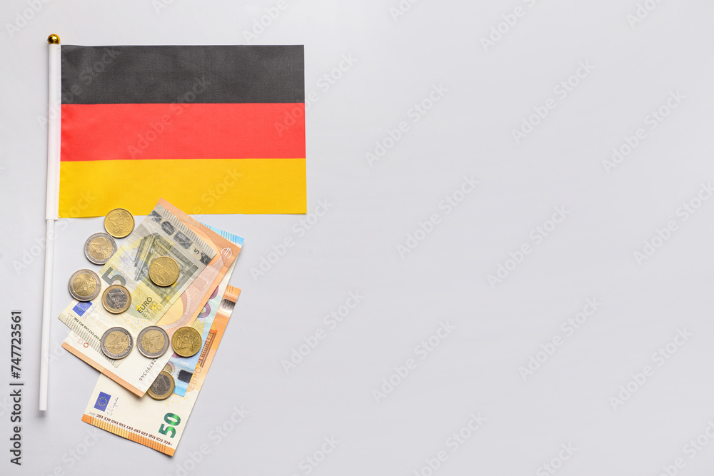 Flag of Germany and money on white background