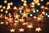Fototapeta  - Star-shaped christmas lights on table with blurred background