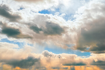 Wall Mural - Sun rays breaking through the clouds