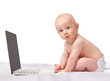 © T. Rose/peopleimages.com - Baby, laptop and studio for entertainment, portrait and games in child development and progressive technology. Infant, happy and newborn for home, diaper and white background for playful time