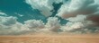 The sky is filled with swirling clouds above a vast dirt field. The clouds seem to dance gracefully over the open expanse of the desert, creating a captivating visual display.