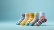 Colorful striped socks on a blue background. The socks are arranged in a row, with the toes pointing to the left.