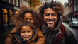 Joyful father with two kids on his back, their radiant smiles matching their curly hair, in a cozy urban setting.
