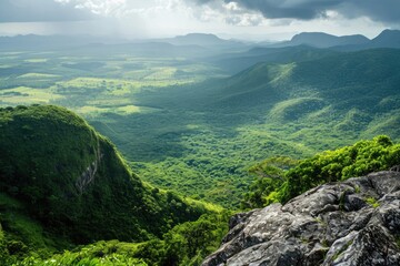 Poster - A view of a verdant valley, enveloped by towering mountains, as clouds loom in the sky, The view from a mountaintop overlooking a verdant valley, AI Generated