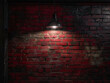 Low key photo of red brick wall with lighting effect