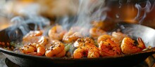 A Frying Pan Filled With Tiger Shrimp Sizzling As They Cook, Creating A Mouthwatering Appetizer At SE Shrimps Restaurant.