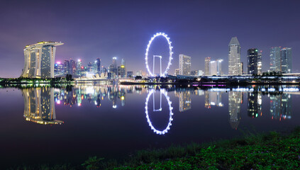 Wall Mural - Panoramic image of Singapore skyline at night.