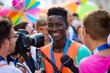 A young smiling happy black male athlete talks to journalists and gives interviews