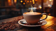 Close-up of a cup of steaming hot coffee on a rustic wooden table