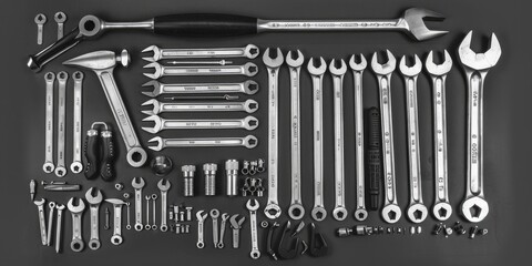 Poster - Various tools arranged neatly on a table. Suitable for DIY, construction, or workshop concepts