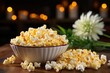 Delicious homemade popcorn in frying pan with bowl of corn kernels on rustic wooden background
