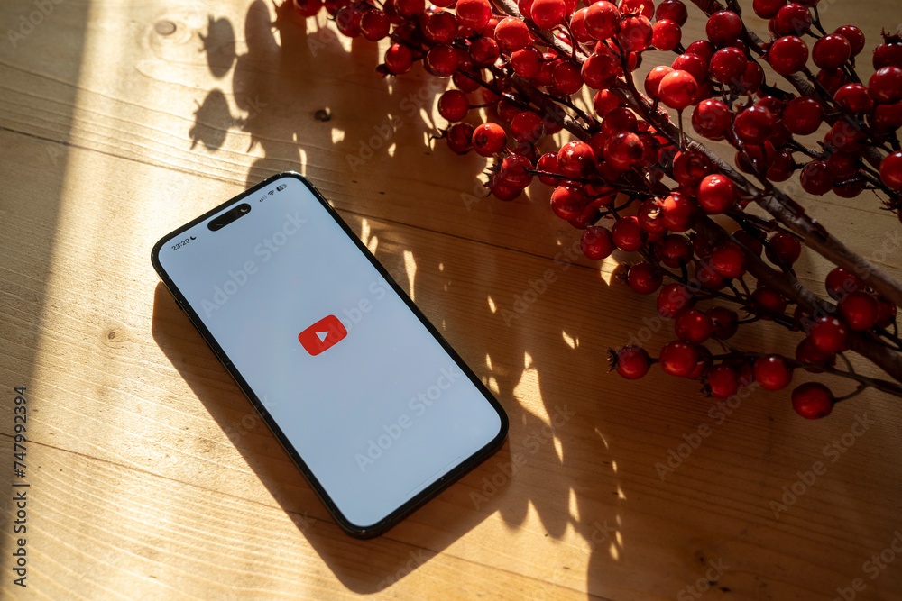 Apple iPhone 14 Pro Max smartphone with YOUTUBE logo. YouTube is also a ...