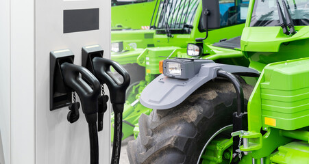 Poster - Electric construction machines with charging station. Concept.